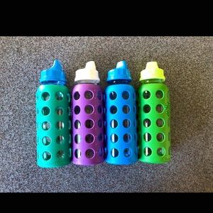 4 glass Life Factory Bottles.